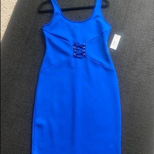 Striking body-con dress in electric blue.